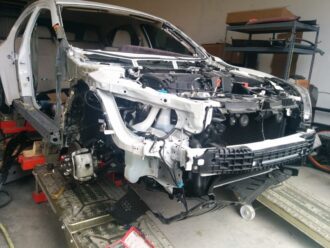 smashed late model car